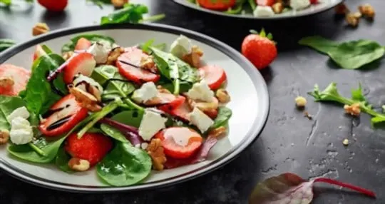 green salad with strawberries